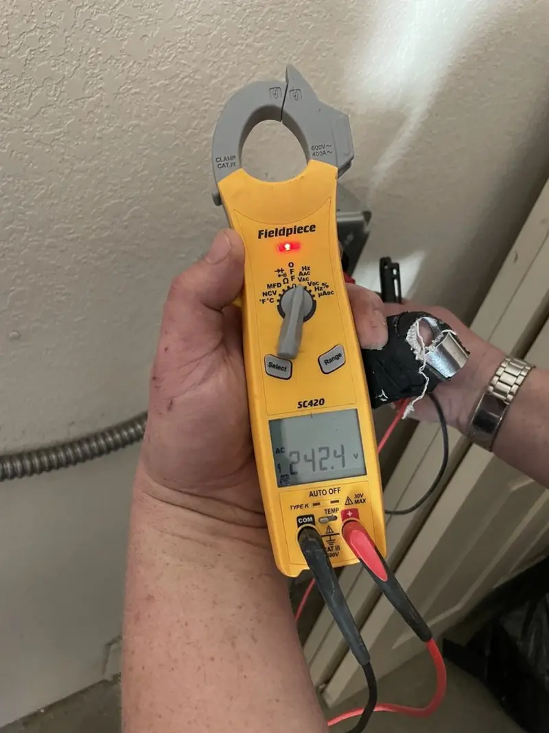 Voltage testing with clamp meter during Electrical Installation Services in Burlingame
